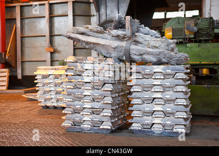 Aluminum bricks on non-ferrous metallurgical plant. Russian metallurgy factory. Raw material Stock Photo