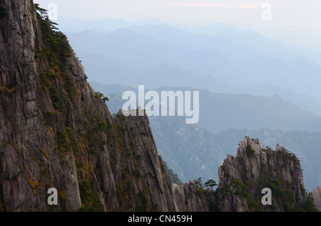 Receding mountain peaks at Stone Column Peak at the West Sea area Huangshan Yellow Mountain China Stock Photo