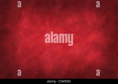 Red mottled background with dark vignette around the edges Stock Photo