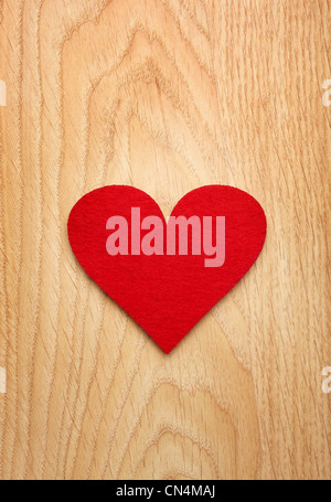 Red heart on the wooden background Stock Photo