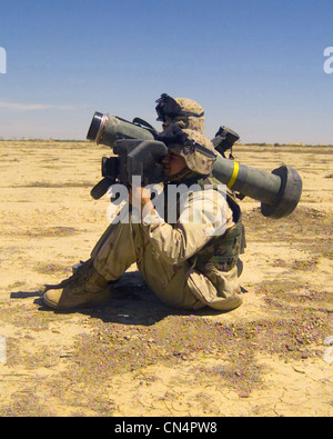 Two US Marine Corps (USMC) members with the 2nd Battalion, 6th Marines fire a Javelin anti-tank missile, at Blair airfield, Iraq, in support of Operation IRAQI FREEDOM. Stock Photo