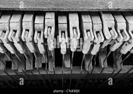 Hammers inside very dilapidated, broken down upright piano. Stock Photo