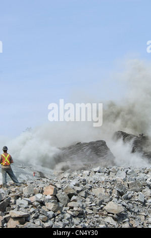 Construction Worker Blasting to make a new Subdivision, Yellowknife, Northwest Territories Stock Photo