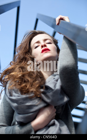 Headshot portrait of a beautiful young woman looking down, London, England, UK. Stock Photo