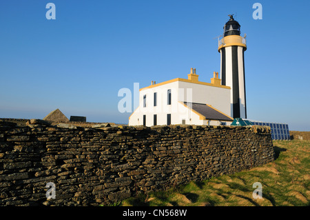 Start Point Lighthouse at sunset, Sanday, Orkney Stock Photo