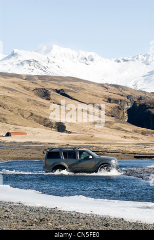 Wild George Drive Four wheel drive car crossing a wooden bridge over a wild gorge, Naryn ...