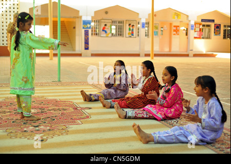Sultanate of Oman, Muscat, view of female kids singing Stock Photo