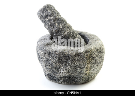 Granite mortar and pestle isolated Stock Photo