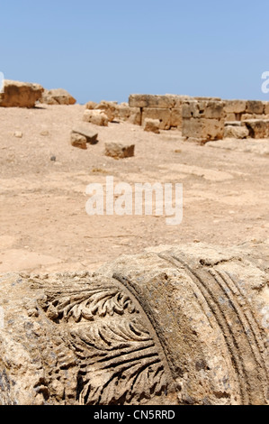 Ptolemais. Cyrenaica. Libya. View of an ornate column capital abandoned on the vast archaeological site. Founded in the 4th Stock Photo