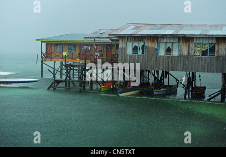 Malaysia, Borneo, Sabah State, Semporna, Mabul, Dayak Lau (Sea Gypsies) living on boats and wooden houses on stilt under the Stock Photo