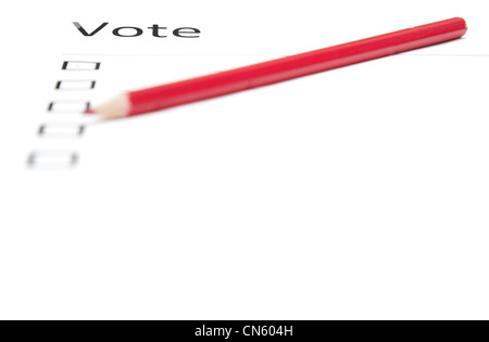 Voting bulletin with red pencil to make choice Stock Photo