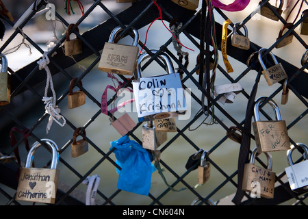 France, Paris, Archeveche bridge, padlocks hung by lovers on the railing Stock Photo