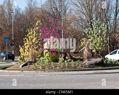 Easter feathers decorations at a roundabout in Sweden Stock Photo