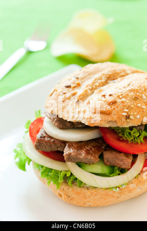 Fresh and healthy sandwich with vegetables and beef sliced Stock Photo