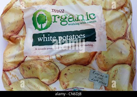 bag of Tesco organic white potatoes Stock Photo