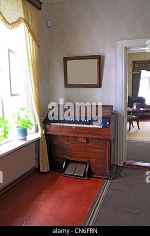 old harpsichord near light window Stock Photo