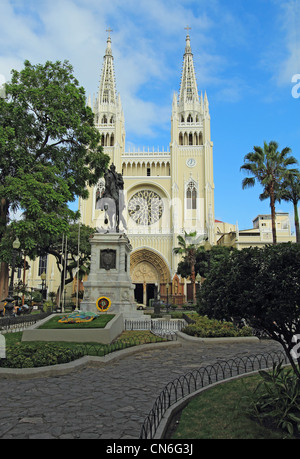 Statue and cathedral from a park in Guayaquil, Ecuador Stock Photo