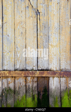 background of ancient retro vintage wooden plank rural building door. Stock Photo