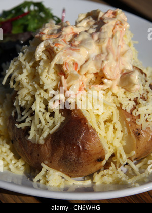 Jacket potato with cheese and coleslaw Stock Photo