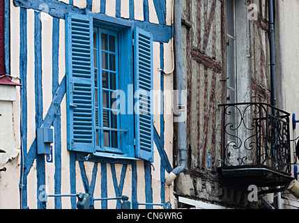 Blue shutters on window of mediaeval building, Auxerre, Burgundy, France Stock Photo