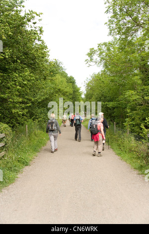 Walkers on the Monsal Dale trail near the Monsal Dale railway bridge in the Peak District in Derbyshire Stock Photo