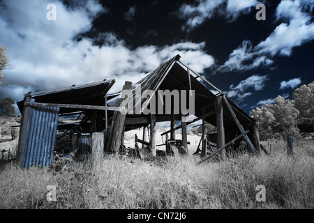 Dilapidated shed, Brogo, NSW AUSTRALIA - infrared image Stock Photo