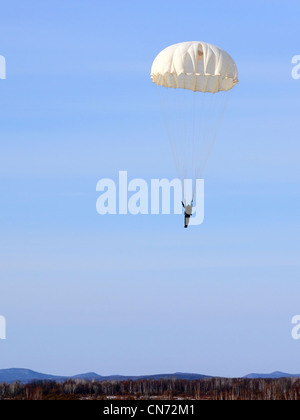 Parachutist Jumper in the helmet after the jump Stock Photo