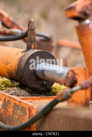 Hydraulic cylinder on farm machinery Stock Photo