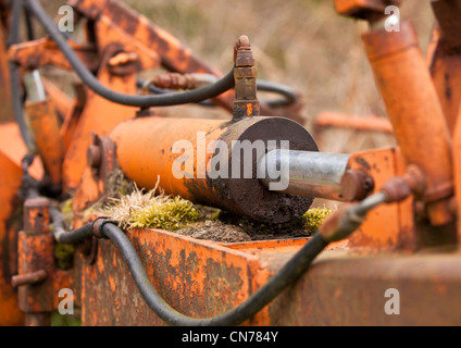 Hydraulic cylinder on farm machinery Stock Photo