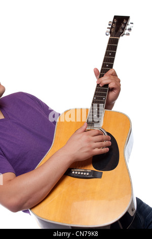 Closeup of a mans hands strumming and electric acoustic guitar isolated over a white background. Stock Photo