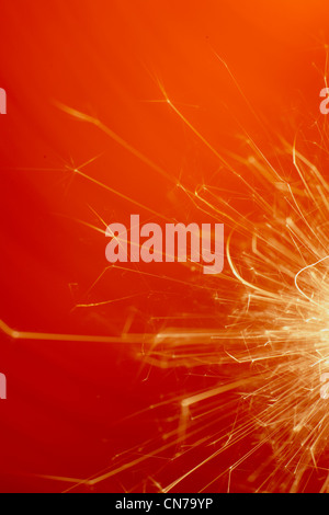 Sparks Flying Exploding detail Close Up Stock Photo - Alamy