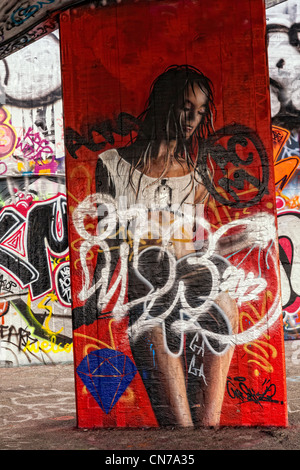 Fantastic graffiti image of girl on red  ....  at the south bank .... Stock Photo