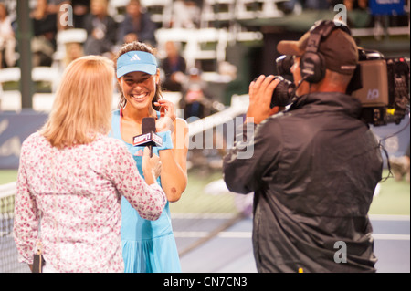 Tennis player, Ana Ivanovic, smiles while being interviewed after her victory at La Costa Resort. Stock Photo