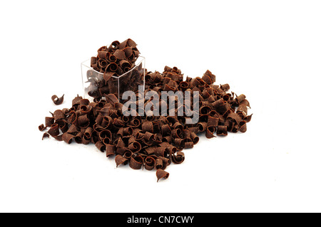 Curled chocolate topping for decoration isolated on white background Stock Photo