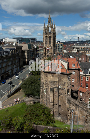 St Nicholas Cathedral and  Black Gate or castle keep with Grainger Street along the left hand side in Newcastle on a sunny day Stock Photo