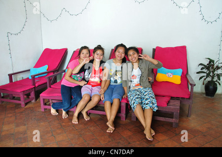 Young female massage parlour workers, Luang Prabang, Luang Prabang Province, Laos Stock Photo