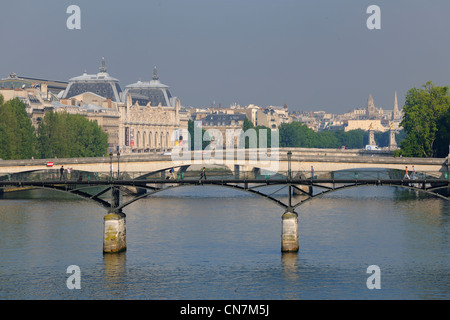 France, Paris, the Seine river banks listed as World Heritage by UNESCO, the Passerelle des Arts and Orsay Museum, housed in Stock Photo