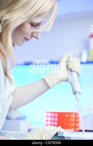 portrait of a female researcher working in a lab Stock Photo