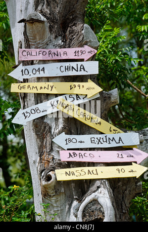 Bahamas, Grand Bahama Island, Freeport, Port Lucaya, wooden sign pointing to the surrounding islands Stock Photo