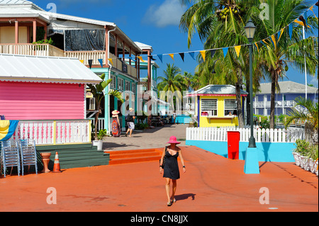 Bahamas, Grand Bahama Island, Freeport, Port Lucaya, Village of colonial houses painted wood at the entrance to the Marina, a Stock Photo