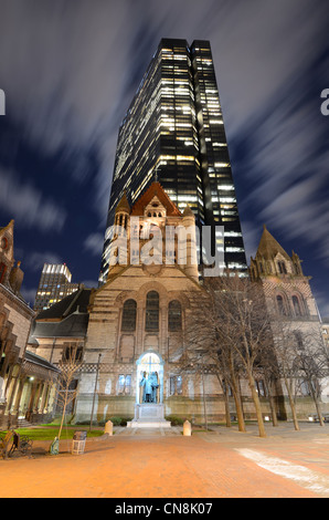 Trinity Church and John Hancock Tower in Copley Square Boston, Massachusetts, USA. The tower is Boston's tallest. Stock Photo