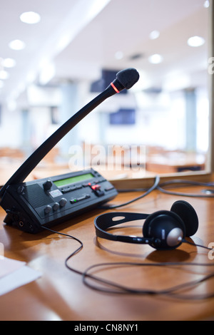 interpreting - Microphone and switchboard in an simultaneous interpreter booth Stock Photo