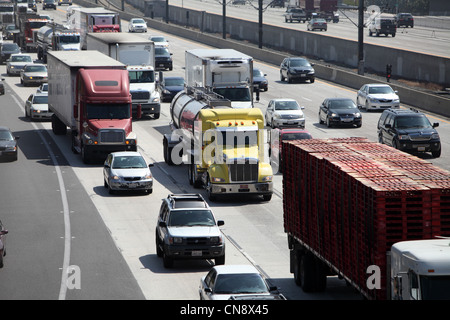 PASADENA, CA, USA - APRIL 10, 2012 - Heavy truck traffic traveling west on the 210 freeway in Pasadena, CA on April 10, 2012. Stock Photo