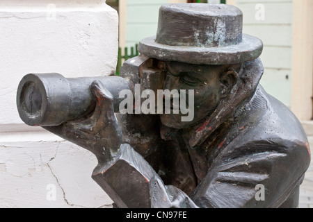 Slovakia, Bratislava, Laurinska, Historic neighborhood, a paparazzi sculpture in front of an Italian restaurant also called Stock Photo