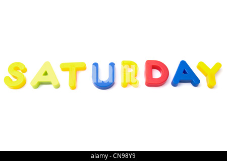 Letter magnets 'Saturday' closeup on white background Stock Photo