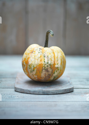 Yellow squash on wooden board Stock Photo