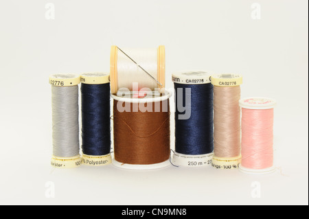 cotton reels taken on a white background sewing thread for needlework sewing machine Stock Photo