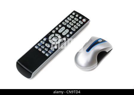 A television remote control and a wireless computer mouse both isolated on white. Stock Photo