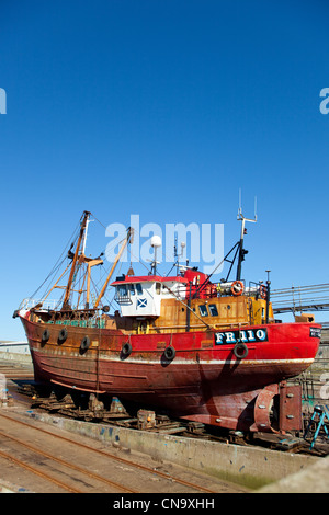 Trawler on the slipways,in repair yards at Peterhead Harbour Scotland UK Stock Photo