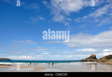 Cornwall - Hayle Bay - beach sky and seascape - blue sky - white clouds  reflections tide washed sand - distant figures Stock Photo